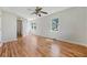 Spacious bedroom featuring hardwood floors, neutral paint, and ensuite bathroom at 2664 Homeland Dr, Atlanta, GA 30360