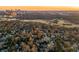 Beautiful aerial view of a community near a sprawling golf course against a stunning skyline backdrop at 401 Peachtree Battle Nw Ave, Atlanta, GA 30305
