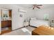 Bright bedroom with white walls, hardwood floors, and a ceiling fan, creating a cozy retreat at 401 Peachtree Battle Nw Ave, Atlanta, GA 30305