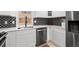Modern kitchen features white cabinetry, stainless steel appliances, and stylish backsplash at 674 Atlanta Se Ave, Atlanta, GA 30312