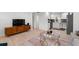 Bright, open living room and kitchen featuring hardwood floors, modern decor, and stainless steel appliances at 674 Atlanta Se Ave, Atlanta, GA 30312