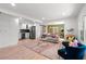 Bright, open living room and kitchen featuring hardwood floors, modern decor, and stainless steel appliances at 674 Atlanta Se Ave, Atlanta, GA 30312