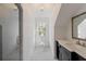 Bright bathroom with black and white patterned tile, marble counter, and glass shower at 0 Winterthur, Sandy Springs, GA 30328