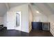 Bright bathroom featuring a shower, vanity, and mini-fridge under a slanted roof at 0 Winterthur, Sandy Springs, GA 30328