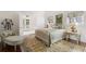 Elegant bedroom with a decorative rug and a view of the outdoor balcony at 0 Winterthur, Sandy Springs, GA 30328