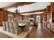 Elegant dining room boasts hardwood floors, wood paneled walls, and a large dining table at 0 Winterthur, Sandy Springs, GA 30328