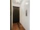 Residential elevator with a wood floor and paneled door at 0 Winterthur, Sandy Springs, GA 30328