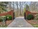 Brick gate and brick-paved driveway create a grand entrance to this private estate at 0 Winterthur, Sandy Springs, GA 30328
