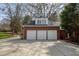 Spacious three-car garage with white doors and a charming cupola, providing ample parking at 0 Winterthur, Sandy Springs, GA 30328