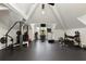 Spacious gym features fitness equipment and natural light at 0 Winterthur, Sandy Springs, GA 30328