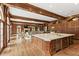 Gourmet kitchen featuring an island, high-end appliances, custom cabinets and wood floors at 0 Winterthur, Sandy Springs, GA 30328
