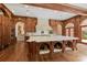 Spacious kitchen island features a marble countertop, custom cabinets, and built-in pet beds at 0 Winterthur, Sandy Springs, GA 30328
