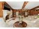 Beautiful living room with a fireplace, hardwood floors, and custom built-in shelving at 0 Winterthur, Sandy Springs, GA 30328