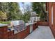 Well-equipped outdoor kitchen with a built-in grill and ample counter space, perfect for entertaining and outdoor cooking at 0 Winterthur, Sandy Springs, GA 30328