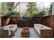 Inviting patio featuring comfortable seating and charming decor, perfect for outdoor relaxation and entertaining at 0 Winterthur, Sandy Springs, GA 30328