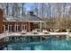 Sparkling pool reflecting the elegant architecture and lush surroundings, creating a serene outdoor oasis at 0 Winterthur, Sandy Springs, GA 30328