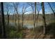 Beautiful water view, surrounded by mature trees and natural foliage, creating a tranquil and serene setting at 0 Winterthur, Sandy Springs, GA 30328