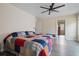Neutral bedroom with ceiling fan, natural light, and attached bath at 120 Centennial Ridge Dr, Acworth, GA 30102