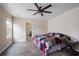 Neutral bedroom with ceiling fan, natural light, and ensuite bathroom at 120 Centennial Ridge Dr, Acworth, GA 30102