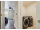 Laundry room with front loading washer and dryer, connected to bedroom at 120 Centennial Ridge Dr, Acworth, GA 30102