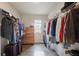 Spacious walk-in closet with wood-look flooring, window and clothing racks at 120 Centennial Ridge Dr, Acworth, GA 30102