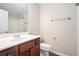 Bathroom with modern vanity, white counter, gray walls, and a shower/tub combo for a clean design at 2398 Chancery Mill Ln, Buford, GA 30519
