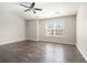 Bright, spacious bedroom with ceiling fan and lots of natural light at 2398 Chancery Mill Ln, Buford, GA 30519