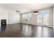 Spacious living room features a fireplace, ceiling fan, and French doors to the outside at 2398 Chancery Mill Ln, Buford, GA 30519