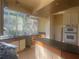 Kitchen featuring a countertop, island, and windows with lots of sunlight at 294 Hascall Nw Rd, Atlanta, GA 30309