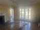 Bright living room featuring hardwood floors, fireplace, and lots of natural light at 294 Hascall Nw Rd, Atlanta, GA 30309