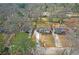 Wide aerial shot of home and neighborhood with mature trees at 3235 Bluebird Ln, Decatur, GA 30032