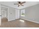 Neutral bedroom with hardwood floors, ceiling fan, and closet at 3235 Bluebird Ln, Decatur, GA 30032