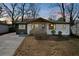 Charming single-story home with a welcoming front porch and modern exterior paint scheme at 3235 Bluebird Ln, Decatur, GA 30032
