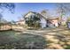 The backyard has a small patio and a large lawn area at 4676 Ridgewood Dr, Forest Park, GA 30297