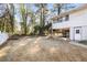 The backyard has a white fence and a lawn at 4676 Ridgewood Dr, Forest Park, GA 30297