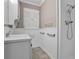 This bathroom has a sink, vanity, shower and tiled walls at 4676 Ridgewood Dr, Forest Park, GA 30297