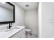 Modern bathroom features a updated vanity and sink, with a new toilet and hardware at 1150 Rankin St # 6H, Stone Mountain, GA 30083