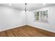 Well-lit dining room showcases hardwood floors and bright natural light at 1150 Rankin St # 6H, Stone Mountain, GA 30083