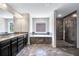 New bathroom with walk-in shower, soaking tub, granite counters, and dual sinks at 218 Lotus Ln, Covington, GA 30016