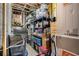 Unfinished basement space with wooden beams, shelving and storage boxes at 233 Retreat Ln, Canton, GA 30114