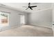 Bedroom featuring neutral walls, carpet and a view through two windows at 270 Piedmont Ne Rd, Marietta, GA 30066