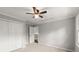 Bedroom featuring neutral carpet, with closet, ceiling fan and natural light at 270 Piedmont Ne Rd, Marietta, GA 30066