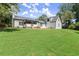 Backyard view of this charming two-story home featuring a well-manicured lawn and a peaceful, private setting at 270 Piedmont Ne Rd, Marietta, GA 30066