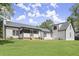 Backyard view of this charming two-story home featuring a well-manicured lawn and a peaceful, private setting at 270 Piedmont Ne Rd, Marietta, GA 30066