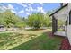 Spacious front yard features a lush lawn, mature trees, and a charming white picket fence at 270 Piedmont Ne Rd, Marietta, GA 30066