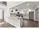 Modern kitchen with white cabinets, granite countertops, and stainless steel appliances at 270 Piedmont Ne Rd, Marietta, GA 30066