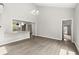 Open-concept living room with hardwood floors and kitchen bar at 270 Piedmont Ne Rd, Marietta, GA 30066