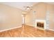 Spacious living room featuring vaulted ceilings, wood floors, and a fireplace at 3500 Patrick Manor Dr, Loganville, GA 30052