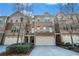 Beautiful brick townhouse with attached garages and meticulously maintained landscaping at 2402 Palladian Manor Se Way # 3, Atlanta, GA 30339