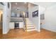 Foyer includes hardwood floors, a beverage bar and stairway leading to upper level at 2402 Palladian Manor Se Way # 3, Atlanta, GA 30339
